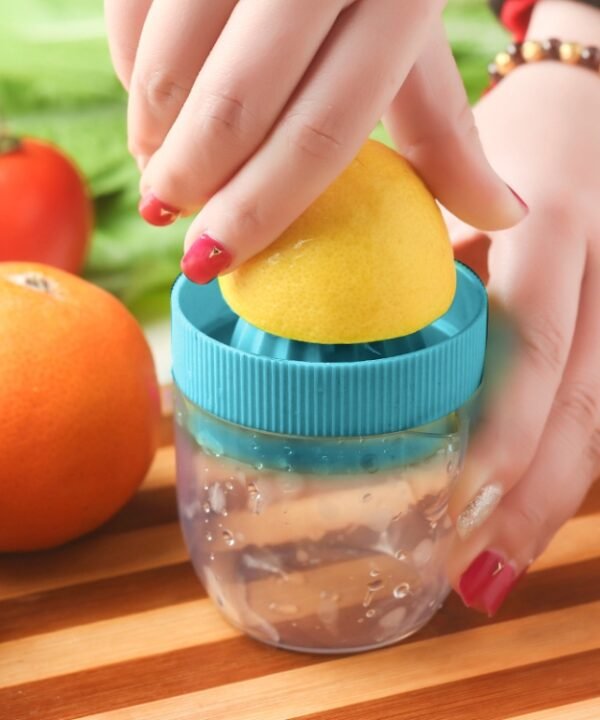 Multi-function Manual Mini Lemon Juicer with a Graduation Cup Juicer